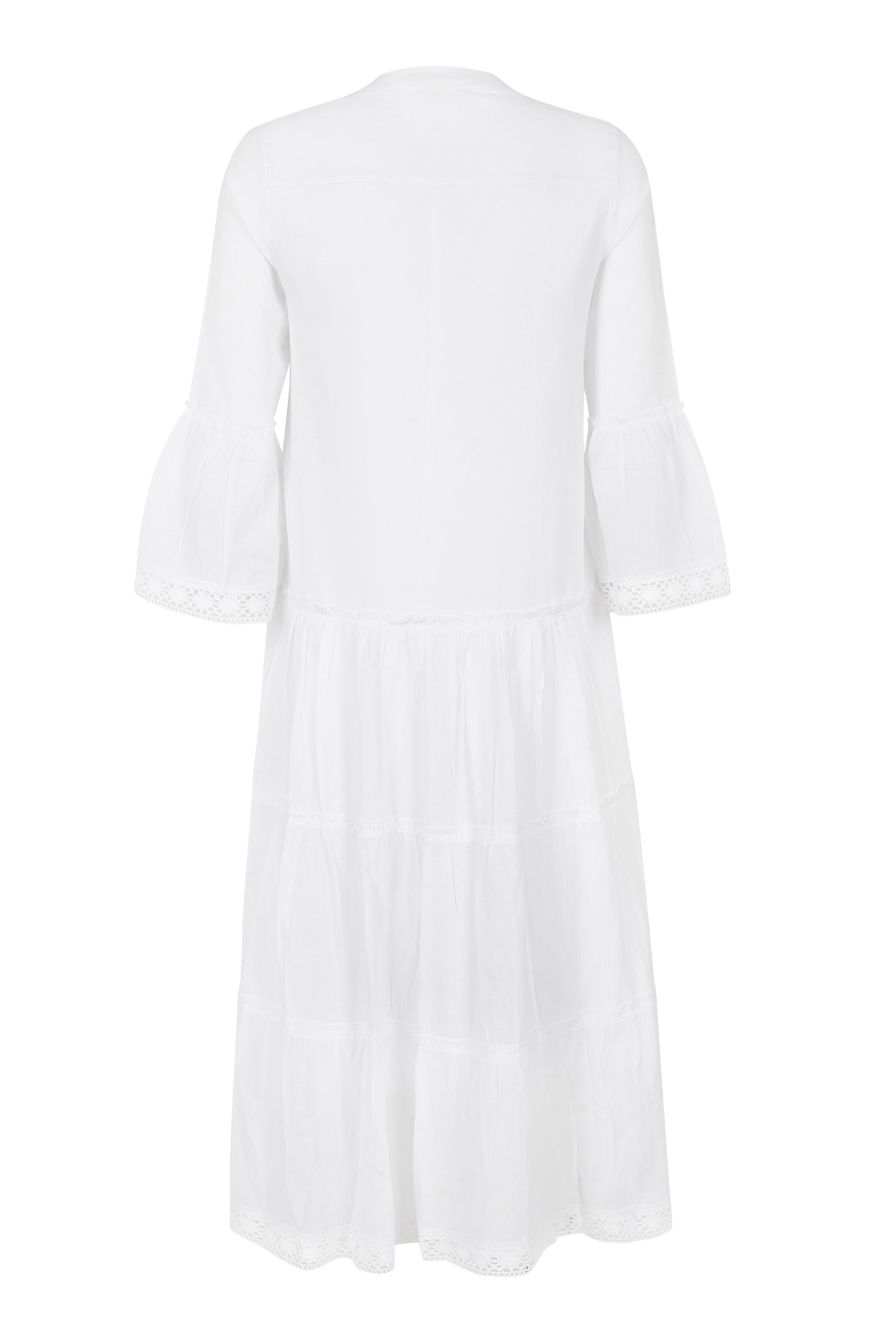 Back view flat-lay of white cotton modest dress with tiered layers highlighting the modest tie-back detail and lightweight fabric at Tela Designs Store.