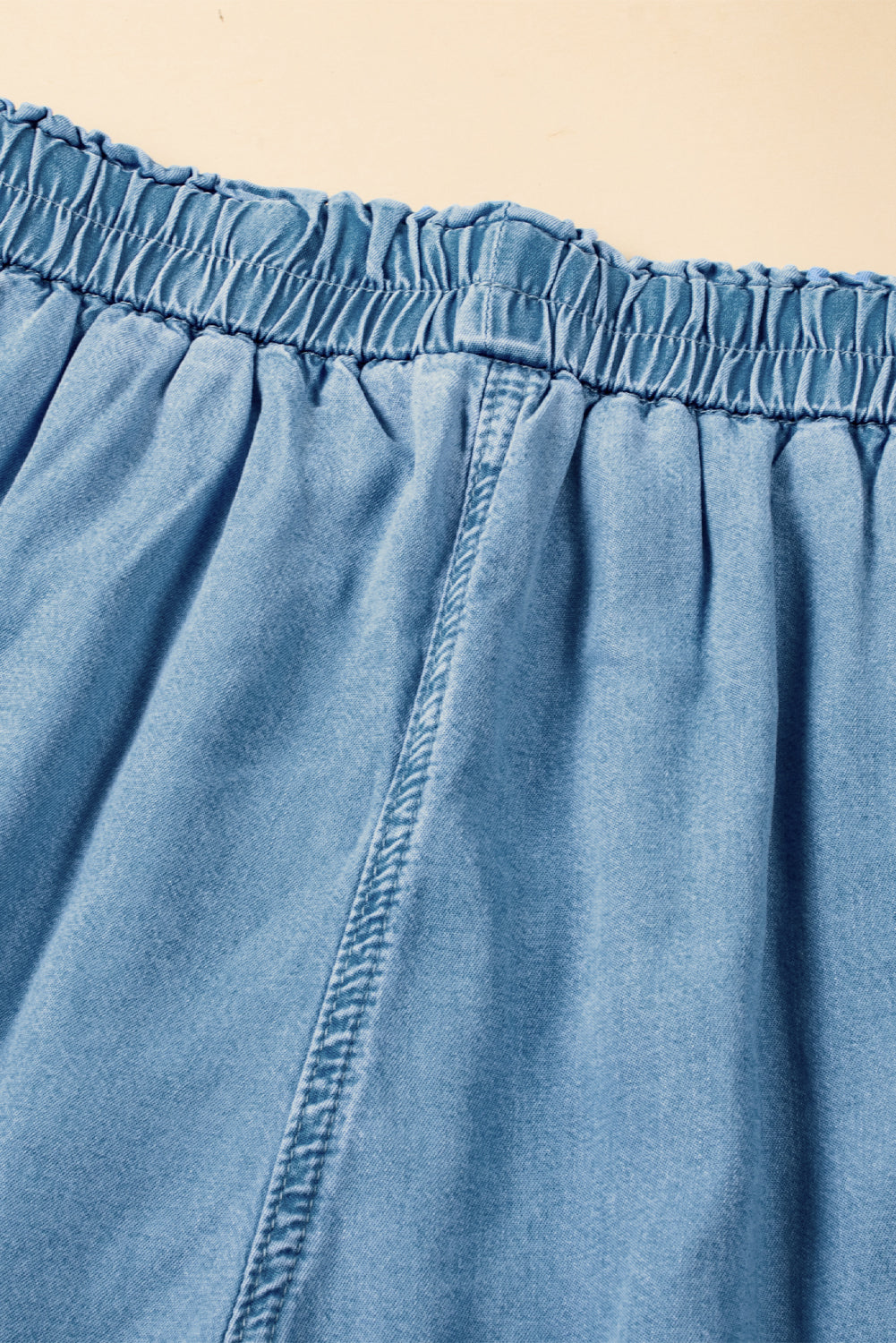 Elastic waistband of modest wide-leg denim pants in soft-washed cotton chambray fabric at Tela Designs Store