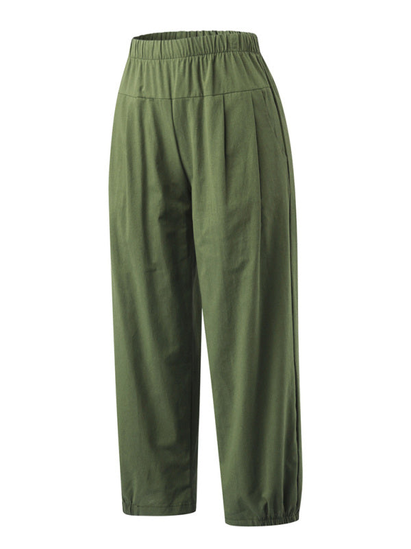Front view showing relaxed-fit sage green cotton-linen pants with high waist and cropped wide-leg design at Tela Designs Store.