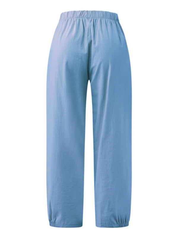 Back view of soft blue wide leg cotton-linen pants showing high waist elastic band and modest drape—unapologetic, breathable style at Tela Designs Store.