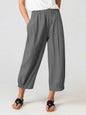 Grey modest cotton-linen pants with cropped hem, styled for effortless Christian women’s everyday wear at Tela Designs Store.