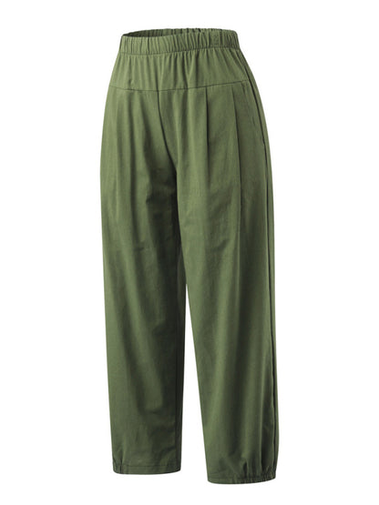 Front view showing relaxed-fit sage green cotton-linen pants with high waist and cropped wide-leg design at Tela Designs Store.
