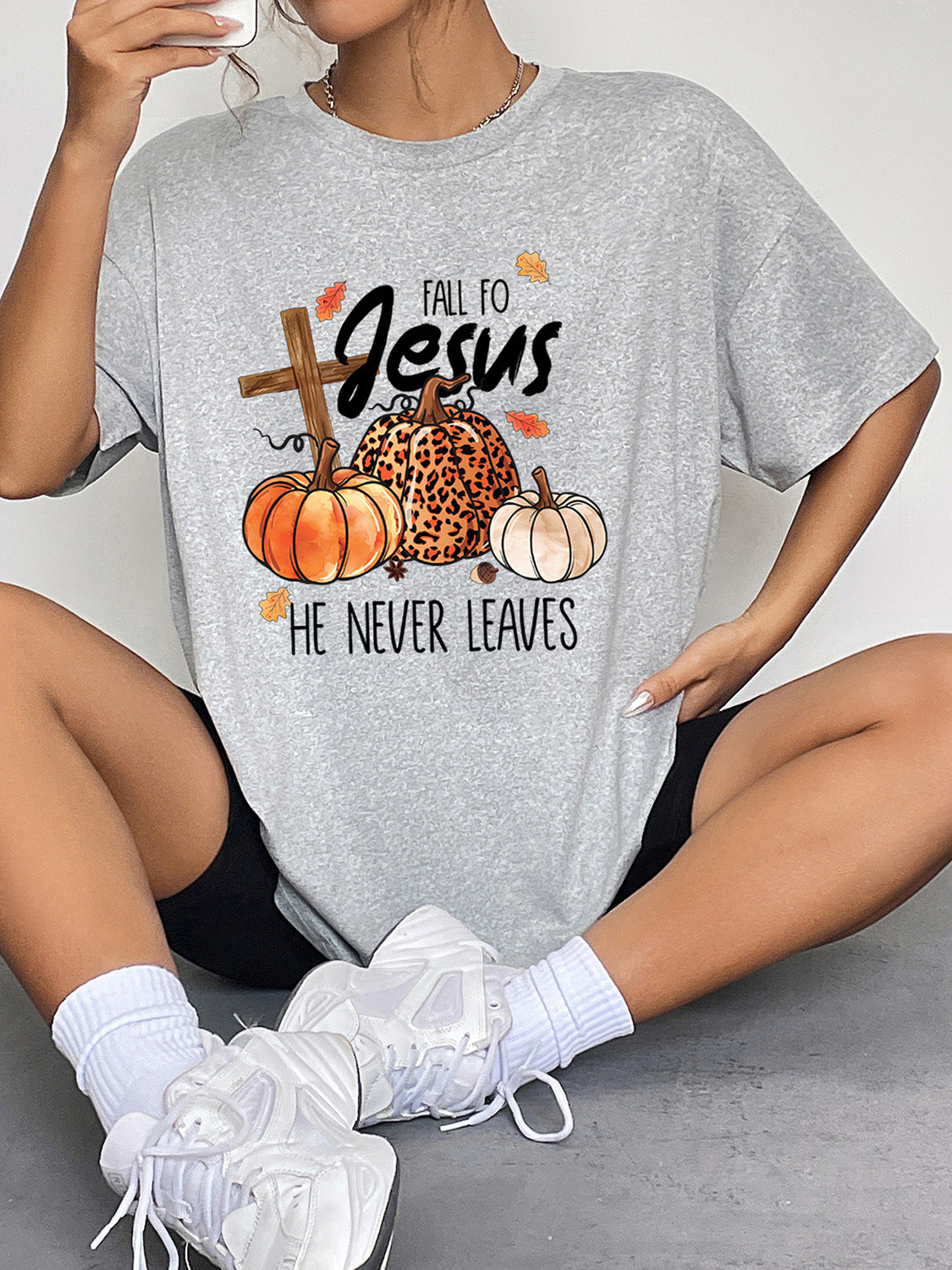 Fall Faith Graphic Tee: 'Fall Into Jesus, He Never Leaves'